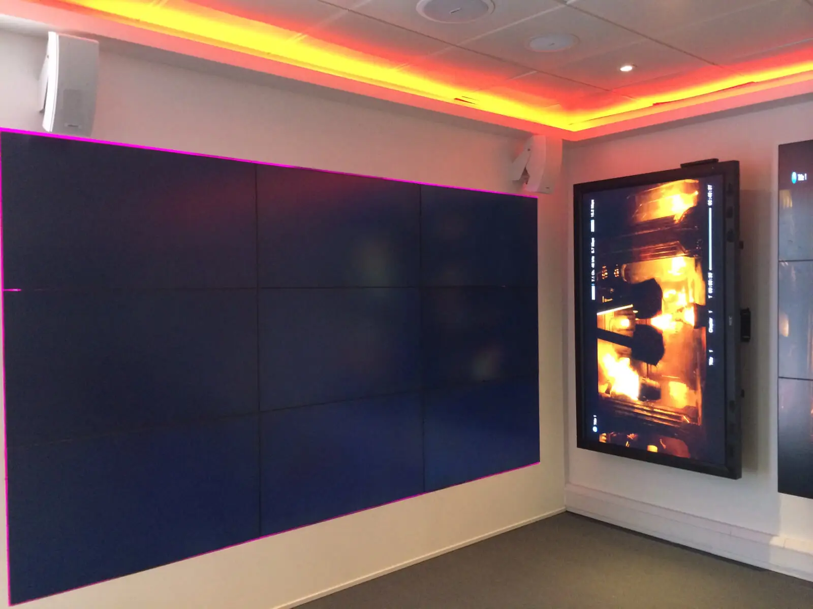 PEL UK Offices space with designer furniture and wall mounted digital screens 25
